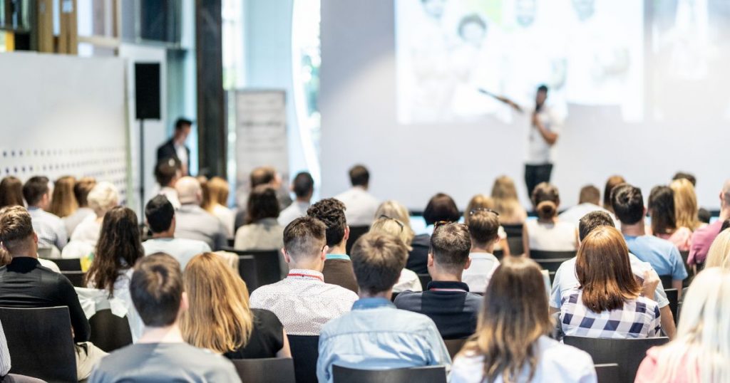 A conference setting relating to DDC attending nEdEx Conference 2026 News Article